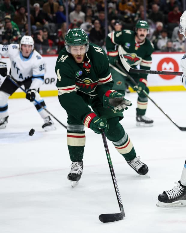 Jan 23, 2025; Saint Paul, Minnesota, USA; Utah Hockey Club center Clayton Keller (9) scores a goal against the Minnesota Wild during the first period at Xcel Energy Center