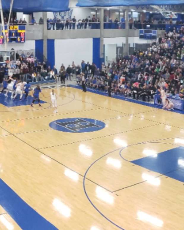 A stock image of a basketball game at Hopkins High School.