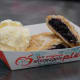 Handmade blueberry pie made with a crisp, flaky crust, filled with blueberries, and served with vanilla ice cream. (Vegan if served without ice cream)At Minneapple Pie, located on the south side of Judson Avenue between Nelson and Underwood streets