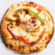 White chicken meat, bell pepper, onion medley, whole milk mozzarella cheese and West Indies Soul Food’s signature Jamaican Jerk Sauce on a buttermilk naan crust baked in a tandoor oven.At West Indies Soul Food, located at the International Bazaar, south wall