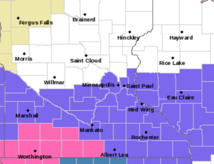 Counties painted pink are in a winter storm warning while counties are blue are under a winter weather advisory.
