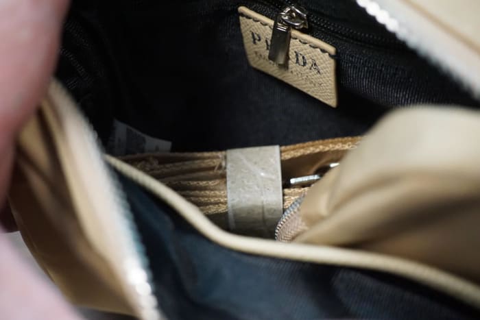 Border patrol officers intercepted a shipment of over 170 bags, including this one, that used logos for designer brands but were counterfeit.