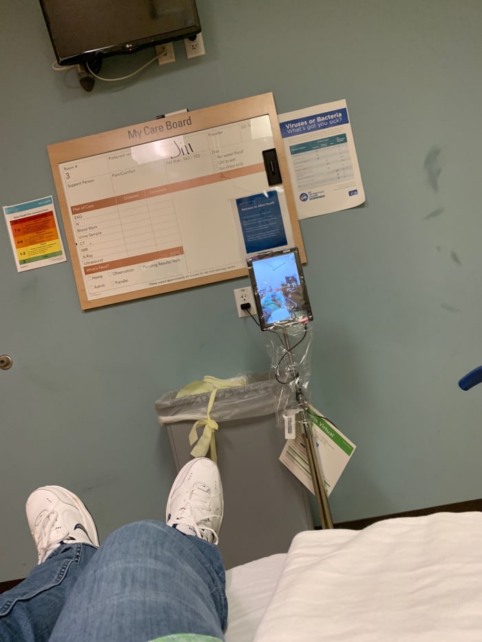 Holsen's view from his bed, showing the monitor and, as Dana Wessel describes, his "dad shoes."