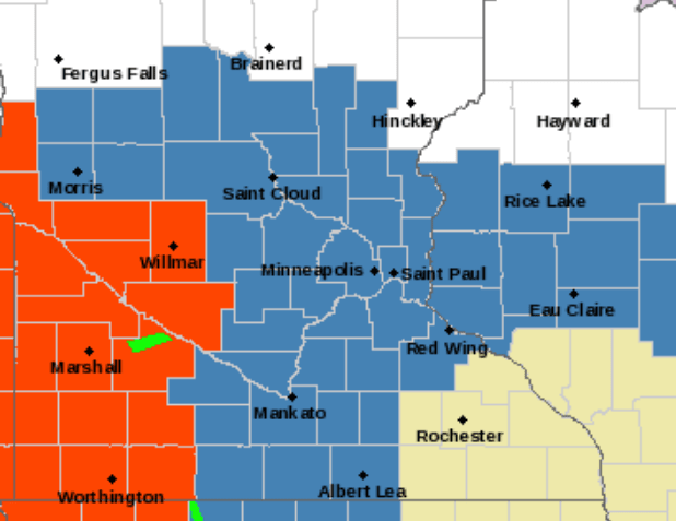 Areas in red are under a blizzard warning. The blue represents a winter storm watch.