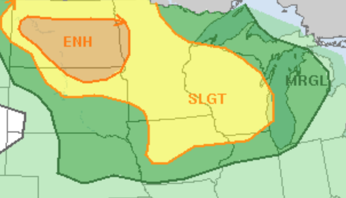 Areas shaded in orange are under an enhanced risk for severe storms. Yellow means scattered severe storms are possible. 