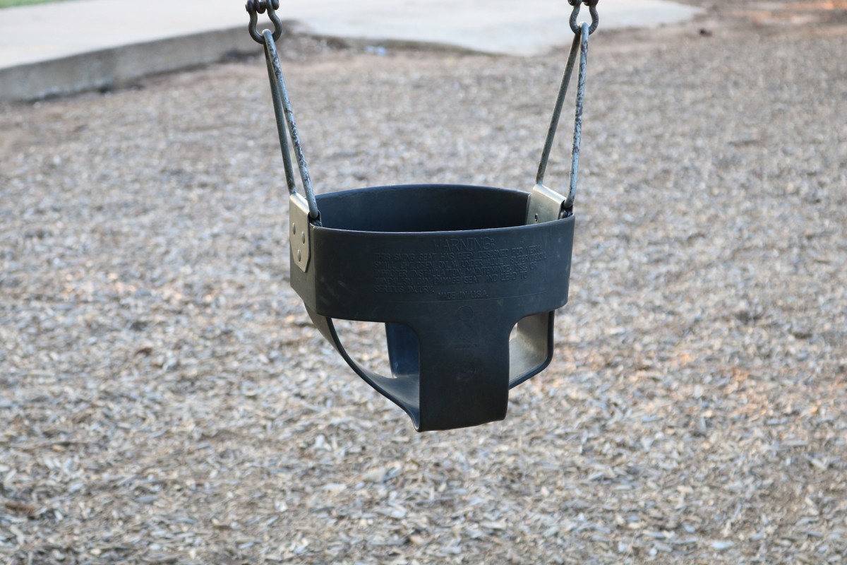 Woman Squeezes Into Baby Swing Gets Stuck At Minneapolis