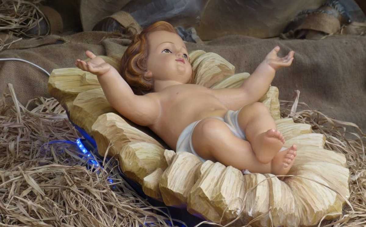 Baby Jesus/manger in nativity scene.