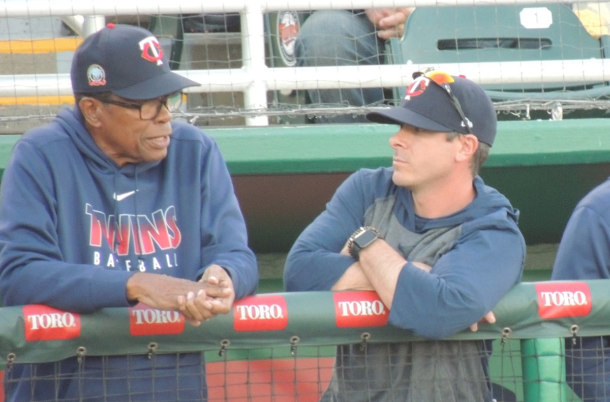 Minnesota Twins second baseman Rod Carew and his 19-month old daughter