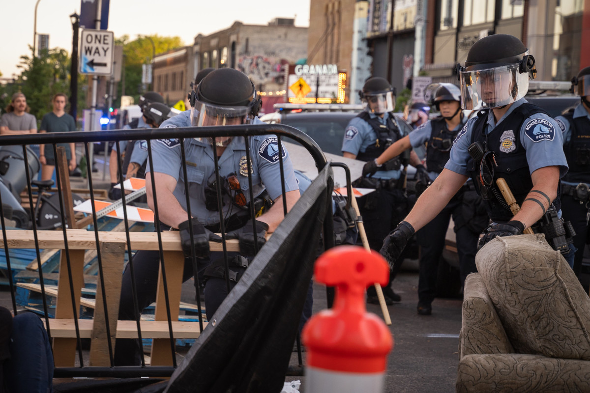 Flickr - police barricades dismantle uptown - Chad Davis