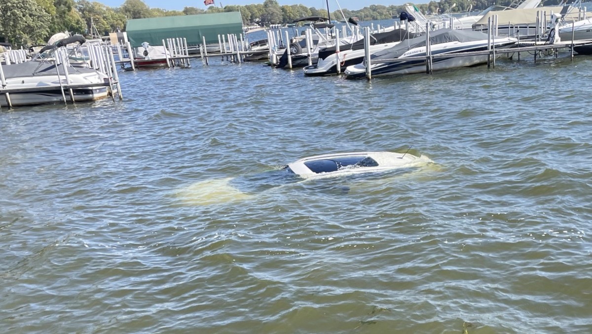 Driver leaves car in neutral, watches it roll and sink into Lake